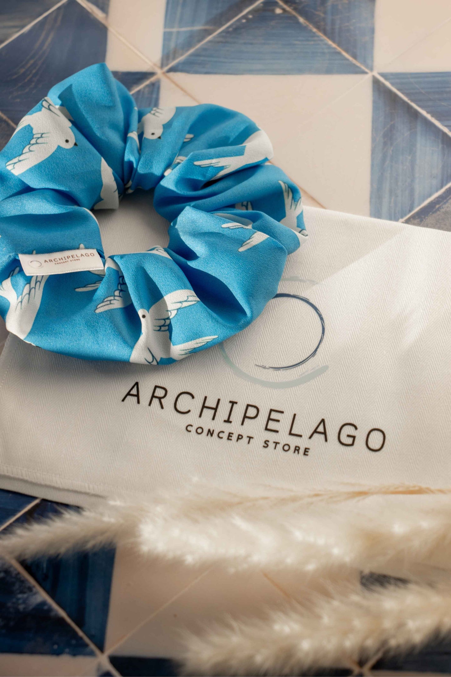Coastal Wings Scrunchie on sunset light