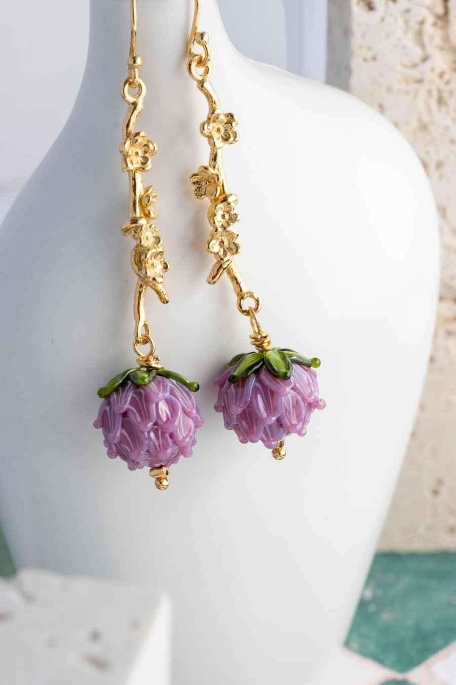 close up to the glass details of the pink charm