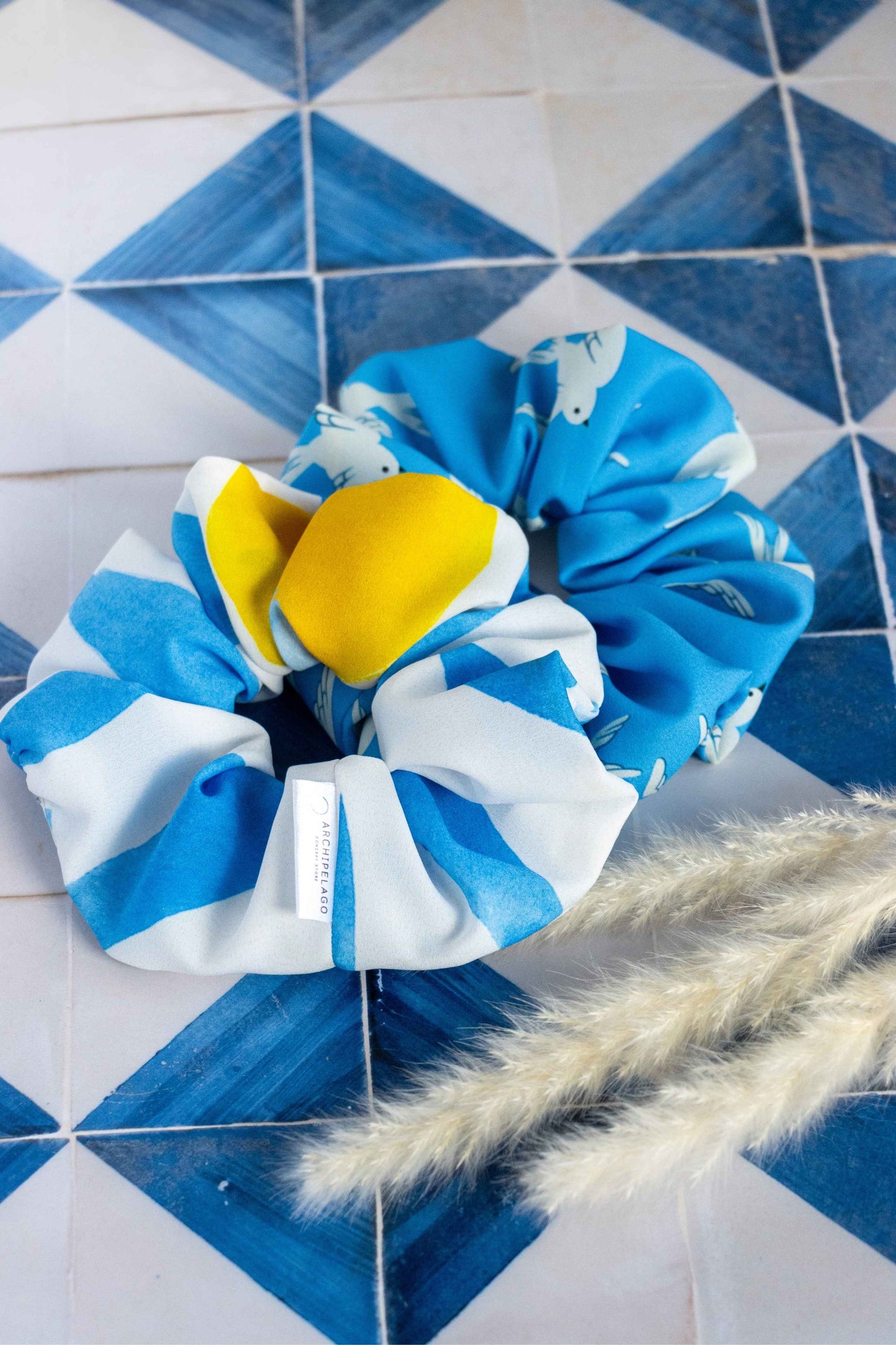 a pair of vivid blue scrunchies