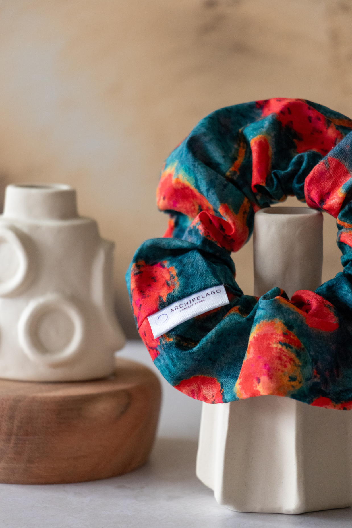 Our Summer Blues scrunchie in a ceramice backround