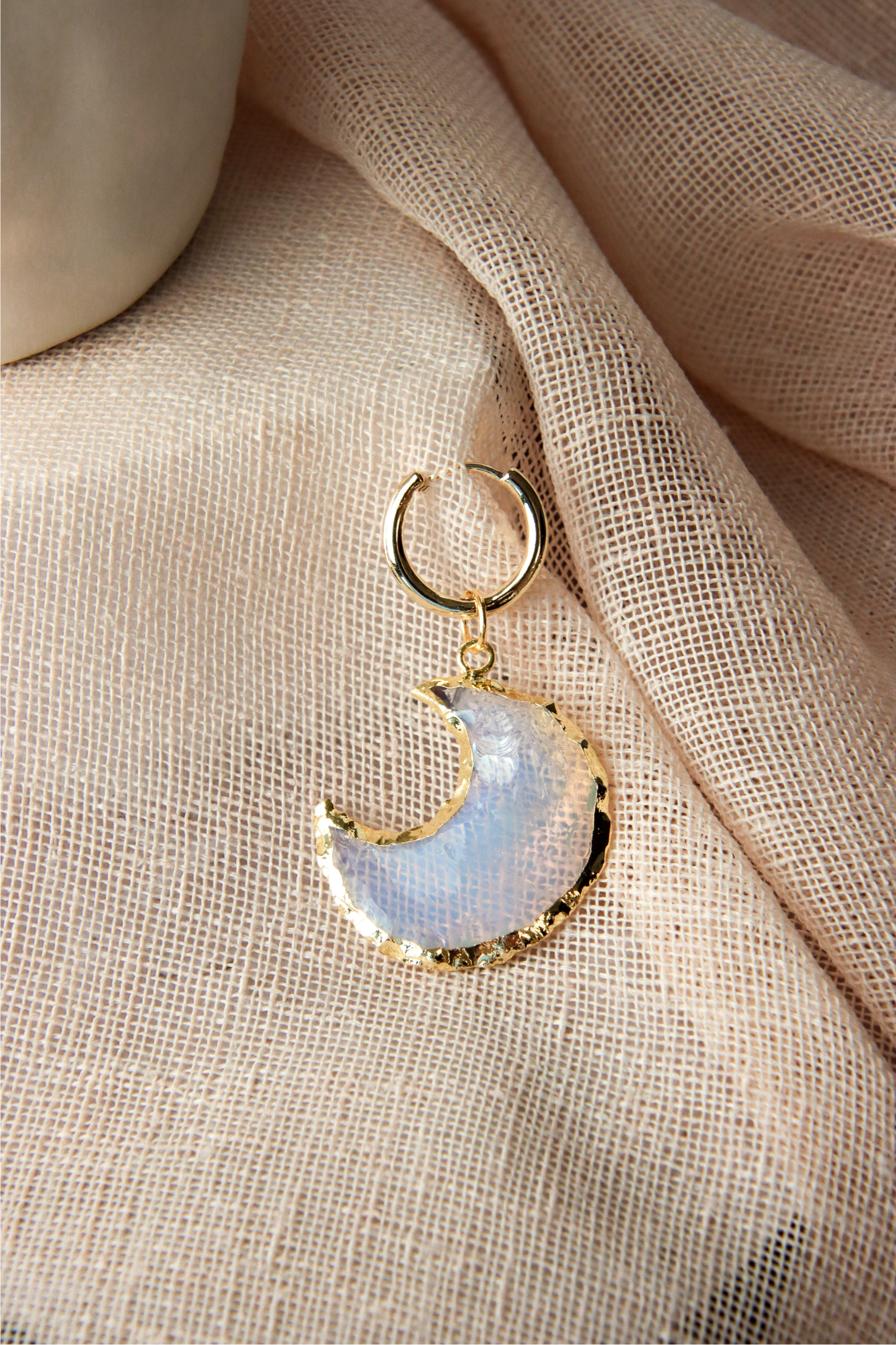 Our opalite moon shaped earrings. The Vertical (Upright) version