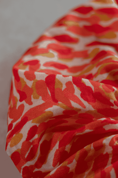 Close-up of red and orange patterned fabric